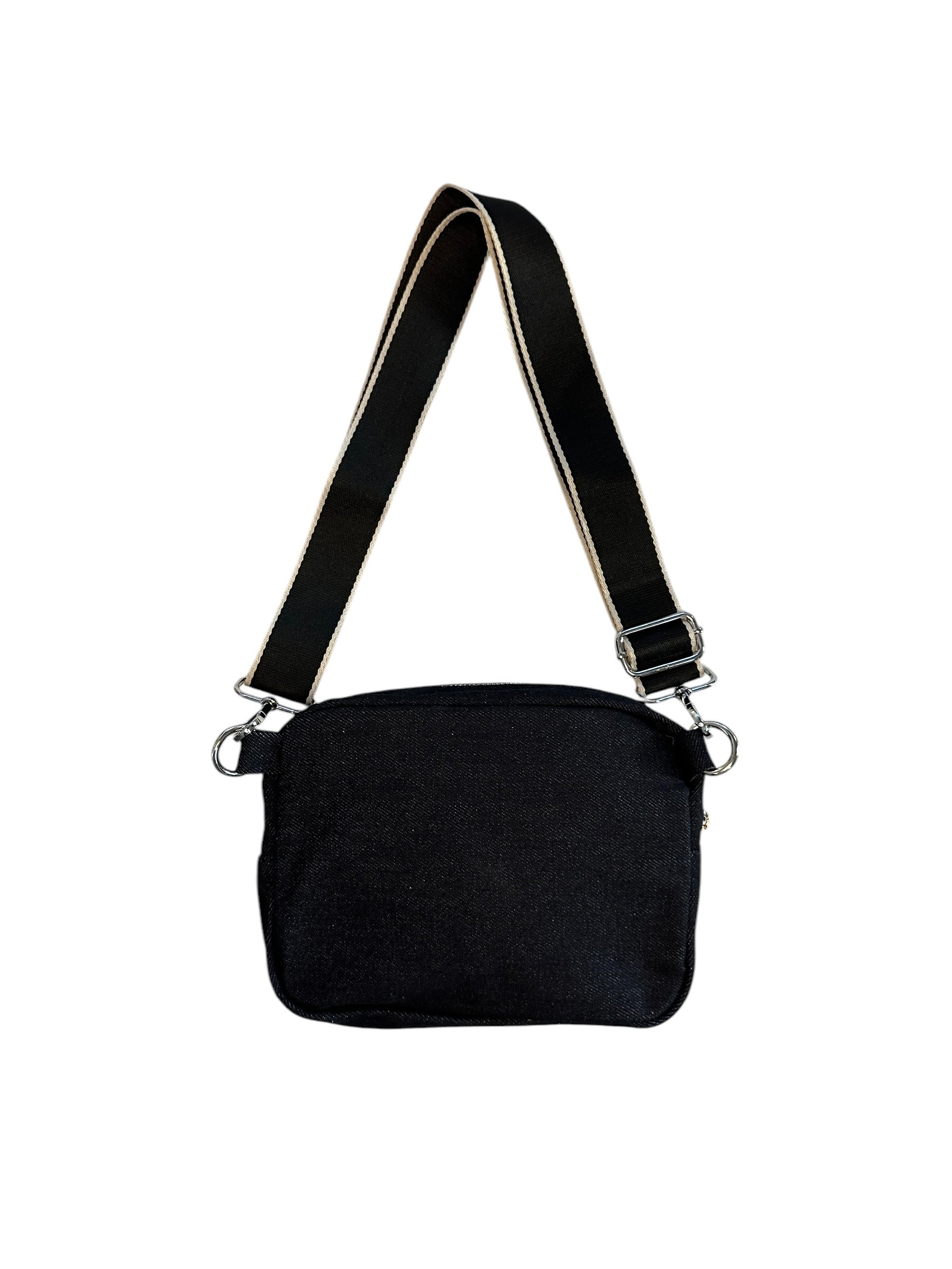 Black denim sling bag with colorful web.