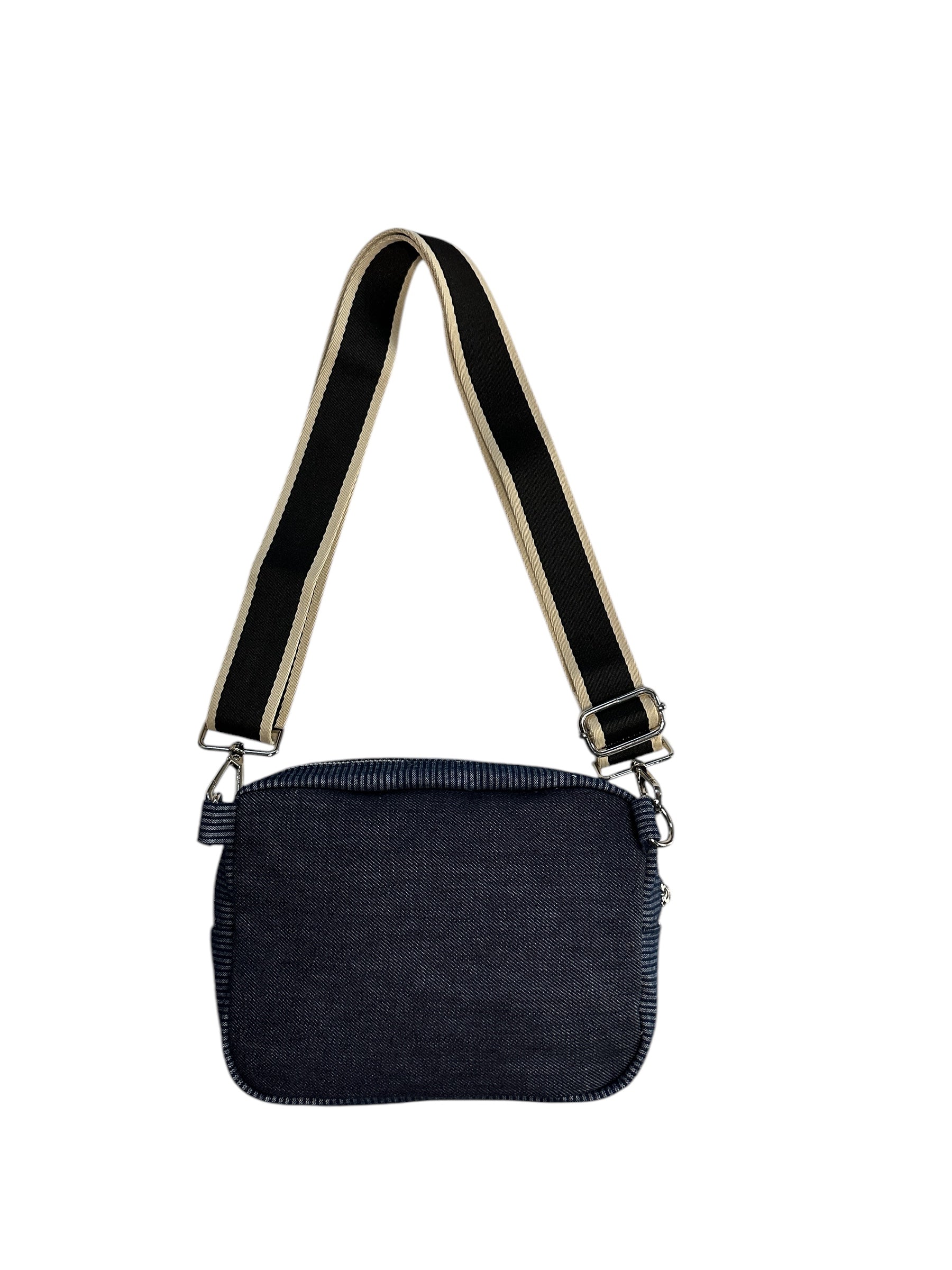 Blue sling bag with colorful web.