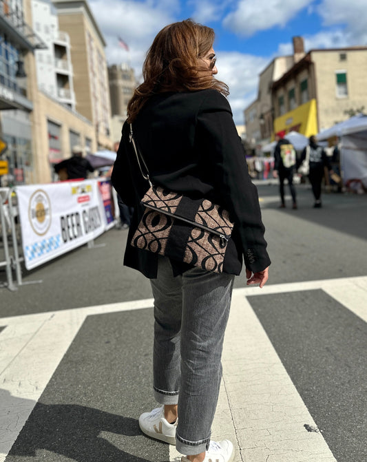 Foldover Crossbody bag with removable strap.