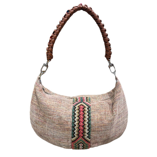 Textured handbag with a braided handle on a white background