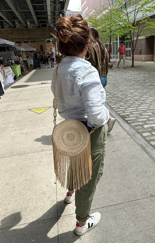 Perfect summer straw bag with fringe.