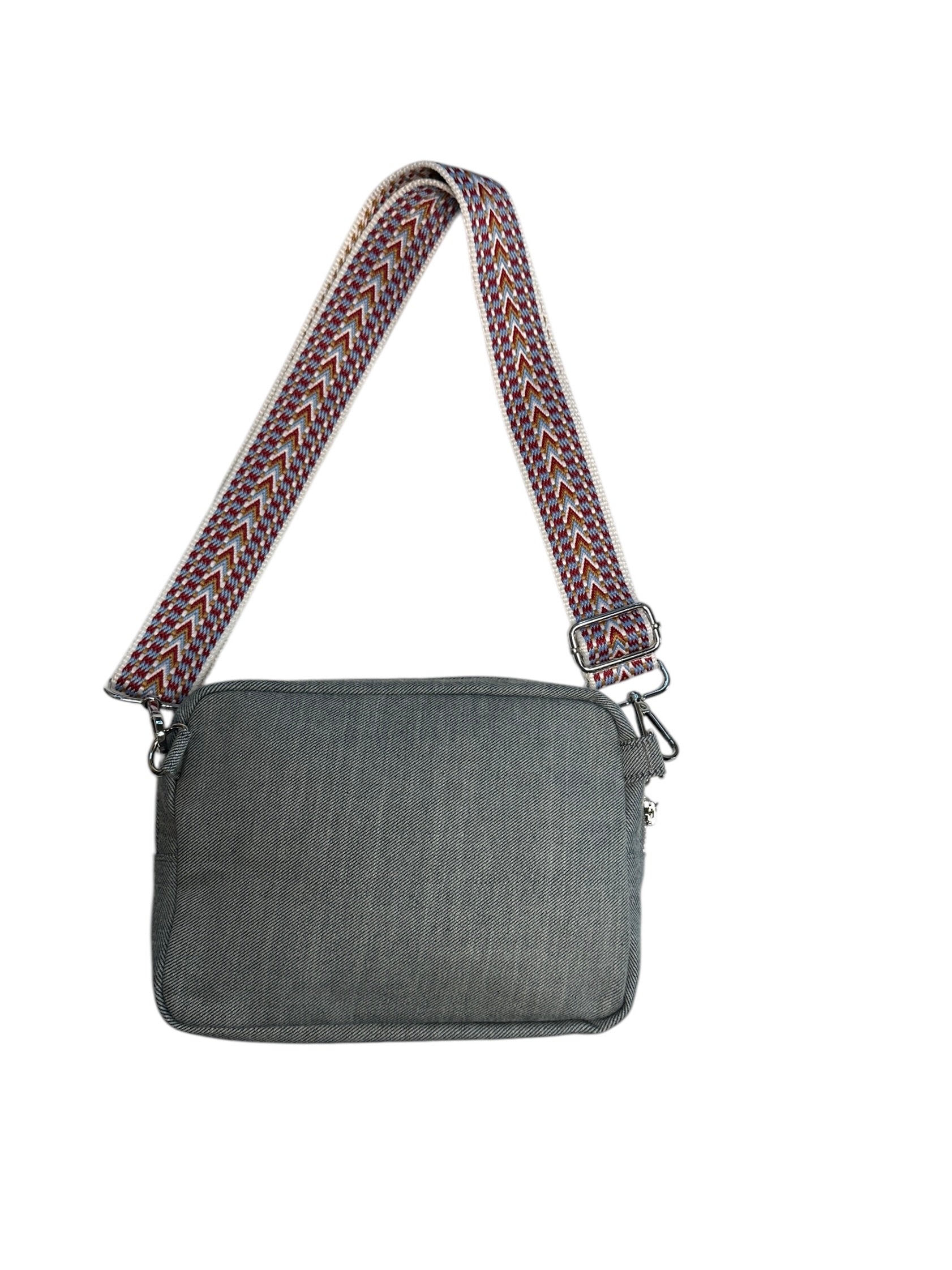 Unisex zebra print denim sling crossbody travel bag, the essential bag for your adventures.
