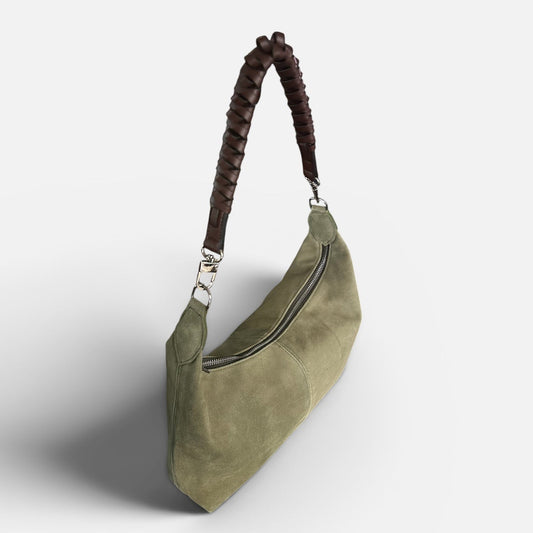 Medium olive suede slouchy shoulder bag featuring a braided leather shoulder strap, soft silhouette, and spacious interior for everyday style.