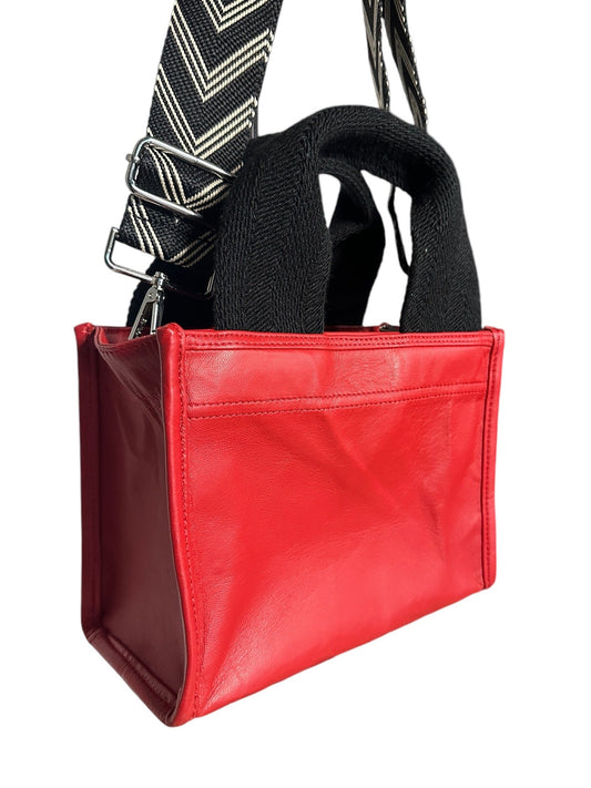 Luxury and practicality in one perfect crossbody tote.