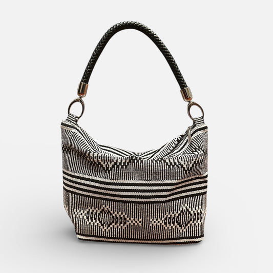 Handbag with a geometric pattern on a white background