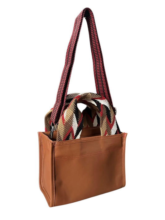 Brown tote bag with plaid patterned interior on a white background