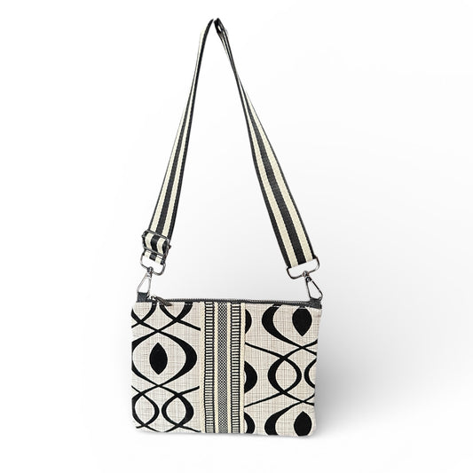 Cream and black print crossbody bag featuring Wayuu strap details