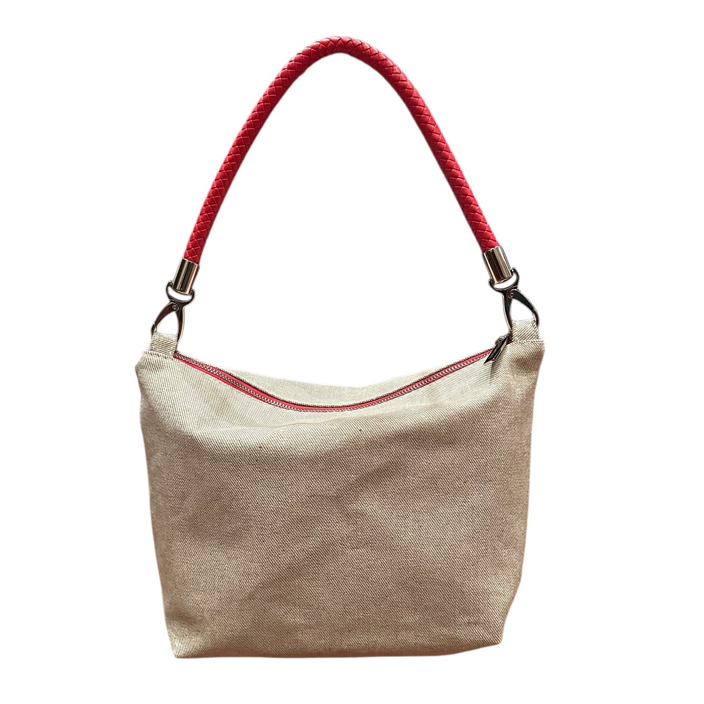 Beige handbag with red handle on a white background