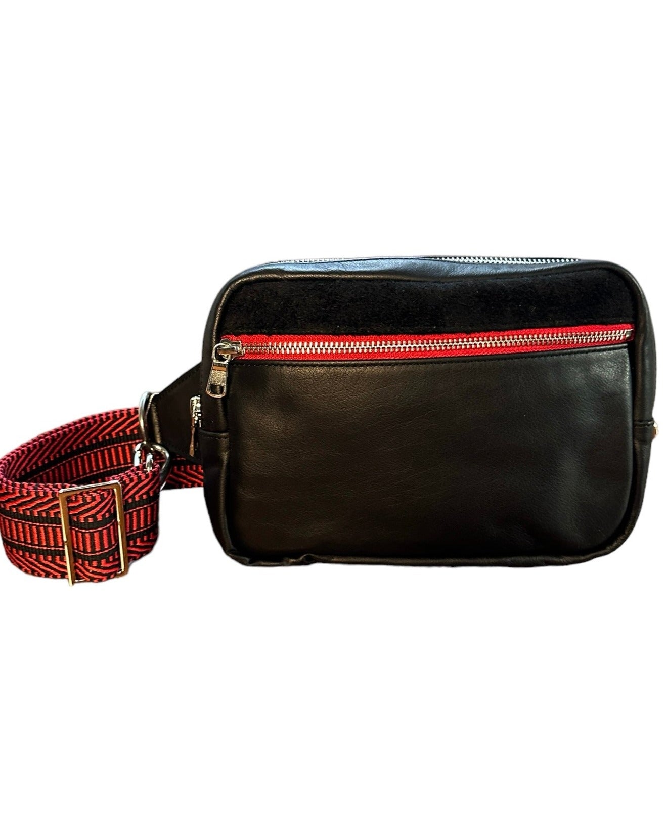 Black leather unisex sling, the ultimate travel bag. 