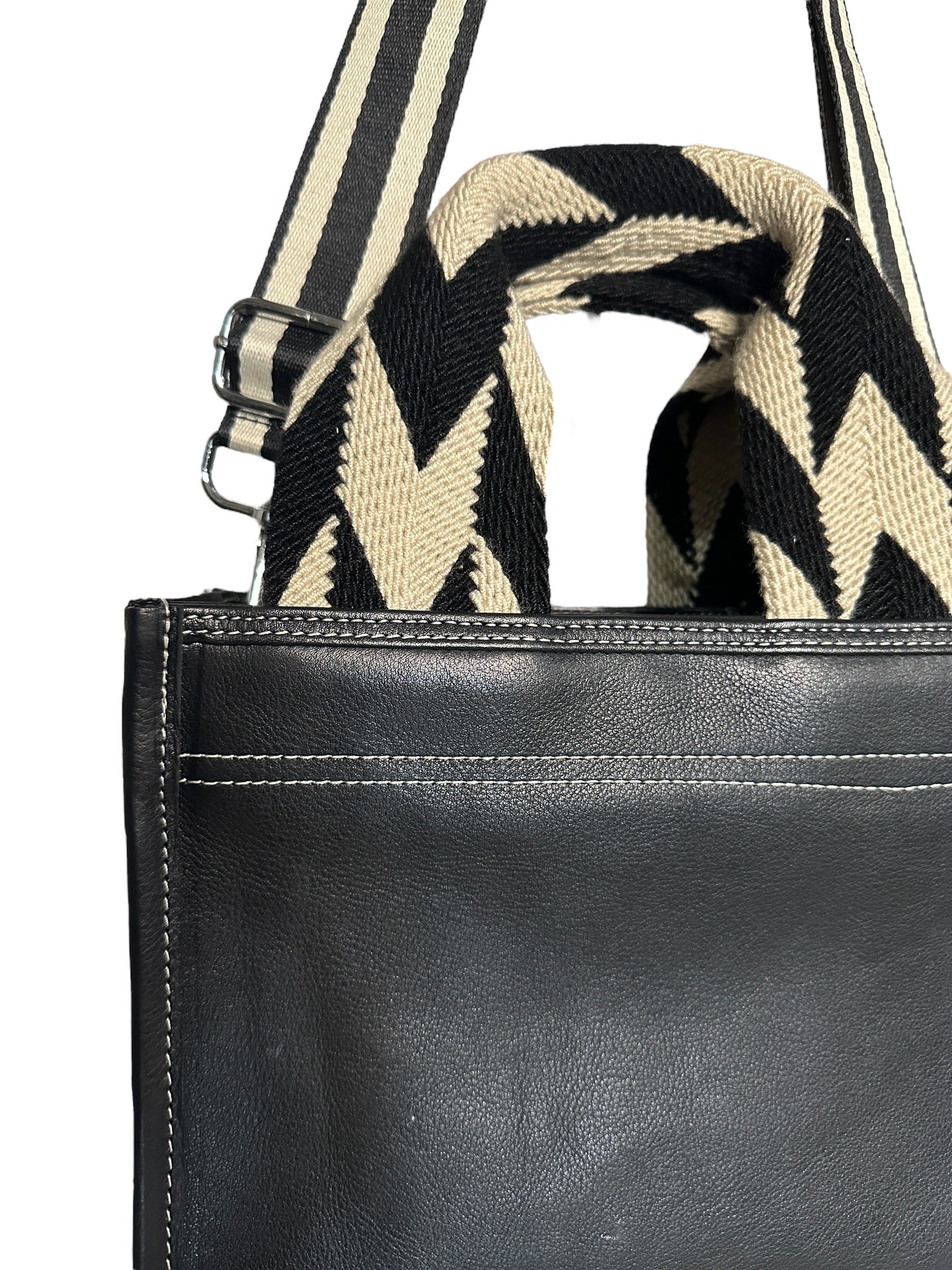 Luxury and practicality in one perfect tote. 