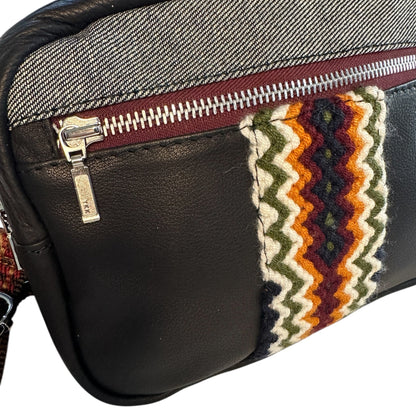 Black leather multi colored crossbody sling bag.