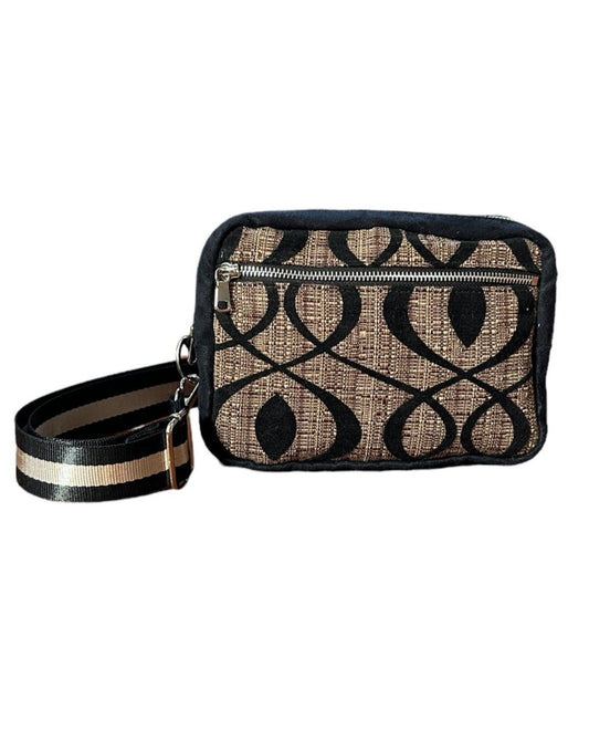 Brown Swirl pattern and faux suede sling bag. 