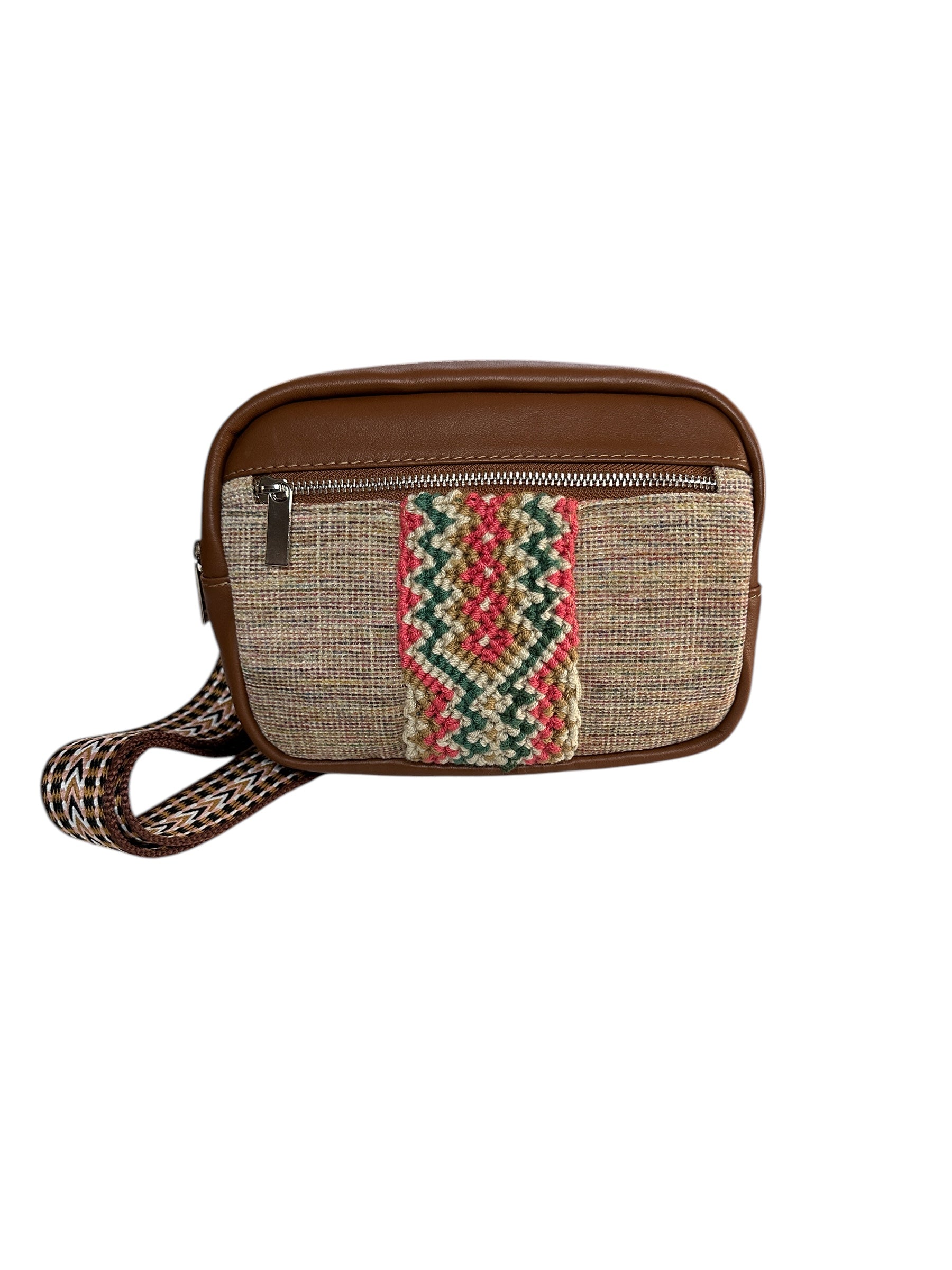 Leather and fabric crossbody sling bag with colorful web.