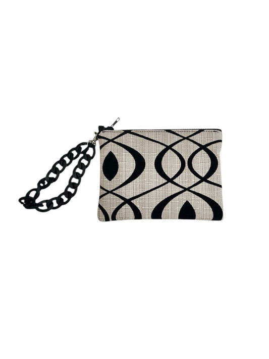 The Cream Swirl cosmetic wristlet, the perfect accessory!