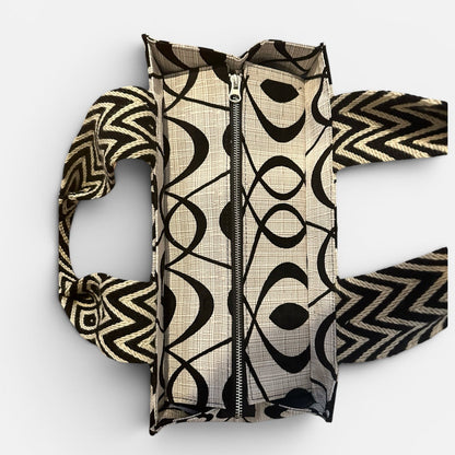 Patterned bag with a zipper on a white background