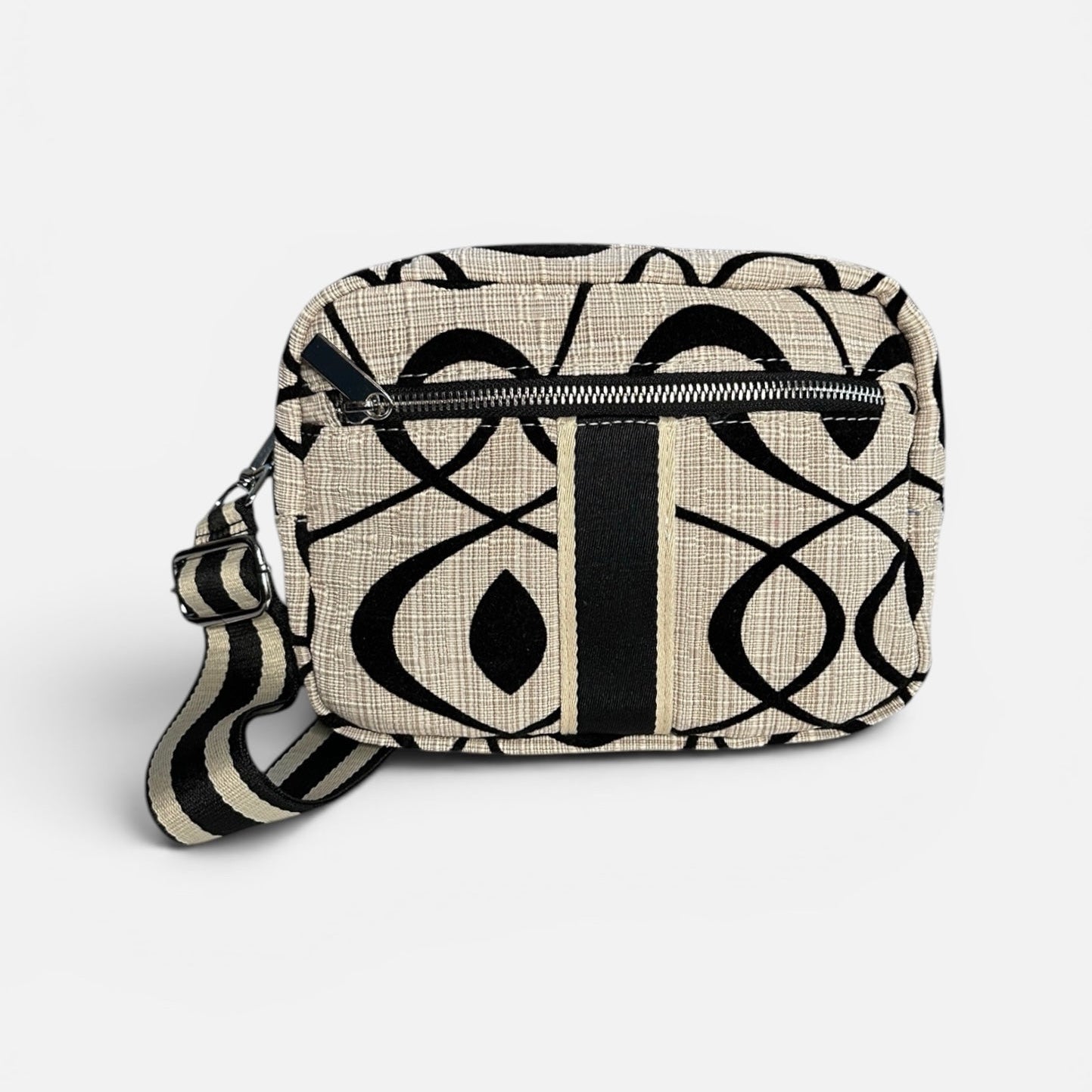 Patterned bag with a strap on a white background