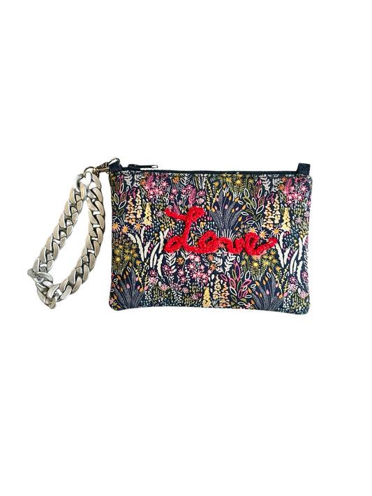 The Love cosmetic wristlet, the perfect accessory!