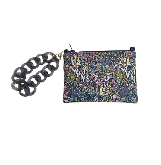 The Dk Vines cosmetic wristlet, the perfect accessory!