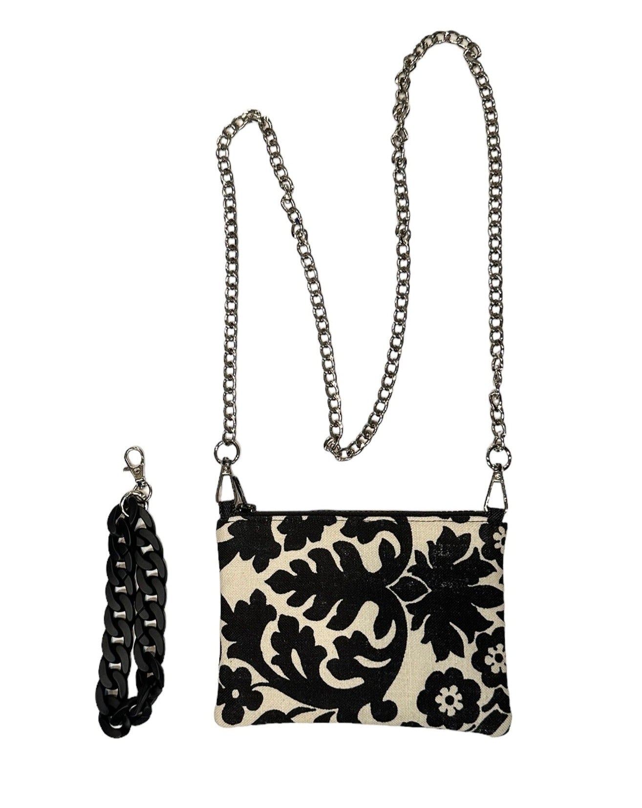 Cream Floral pouch with chain and wristlet. 