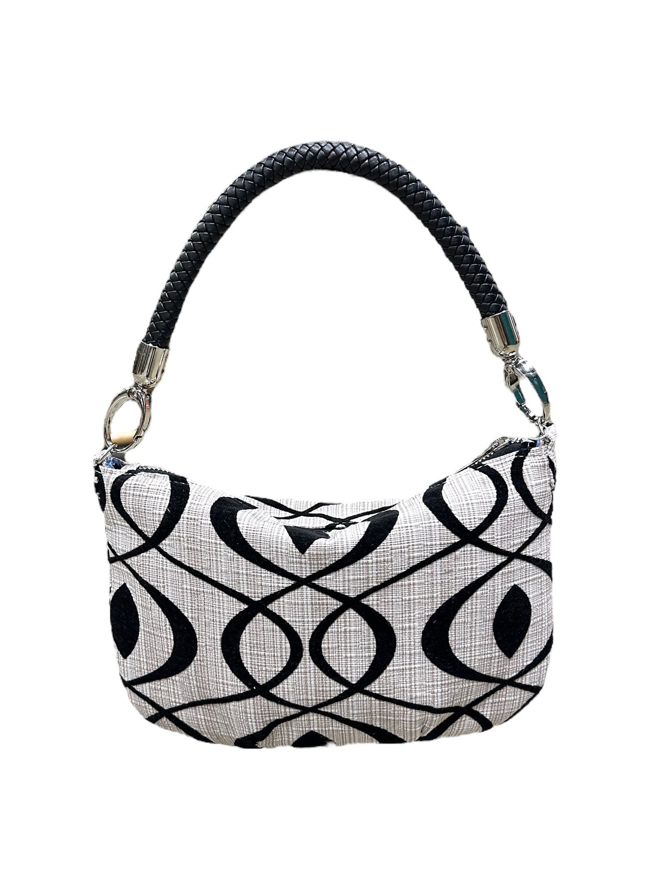 Black and white patterned handbag on a white background