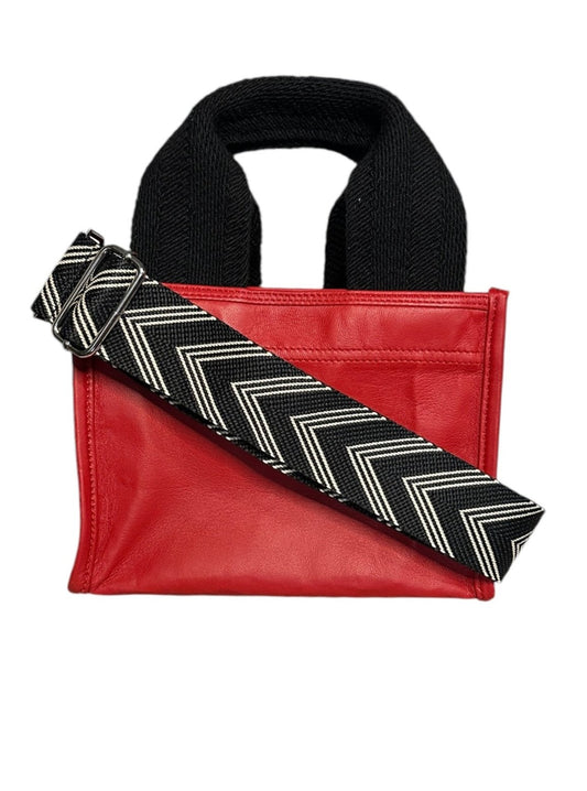 Luxury and practicality in one perfect crossbody tote. 