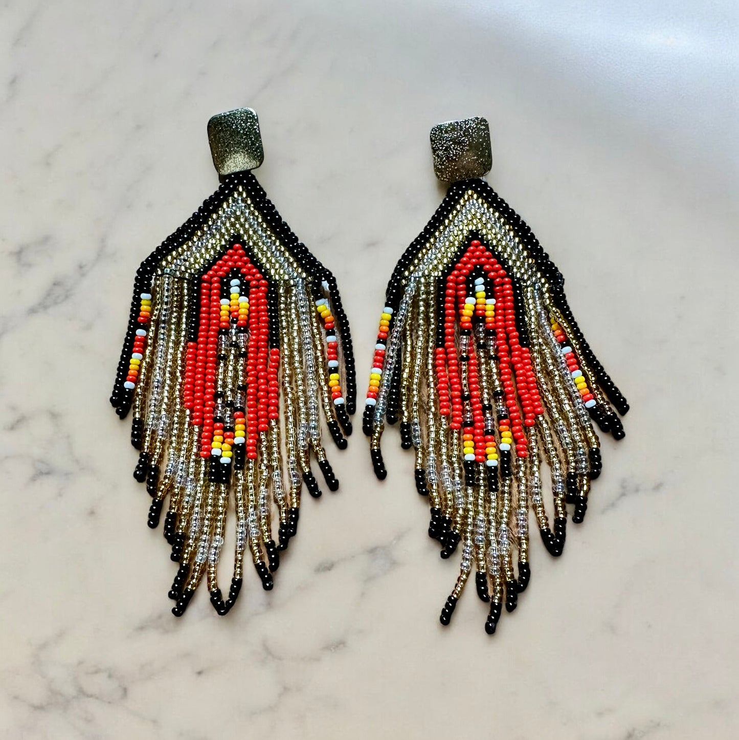 Long handmade multi color statement earrings that are ready to party!