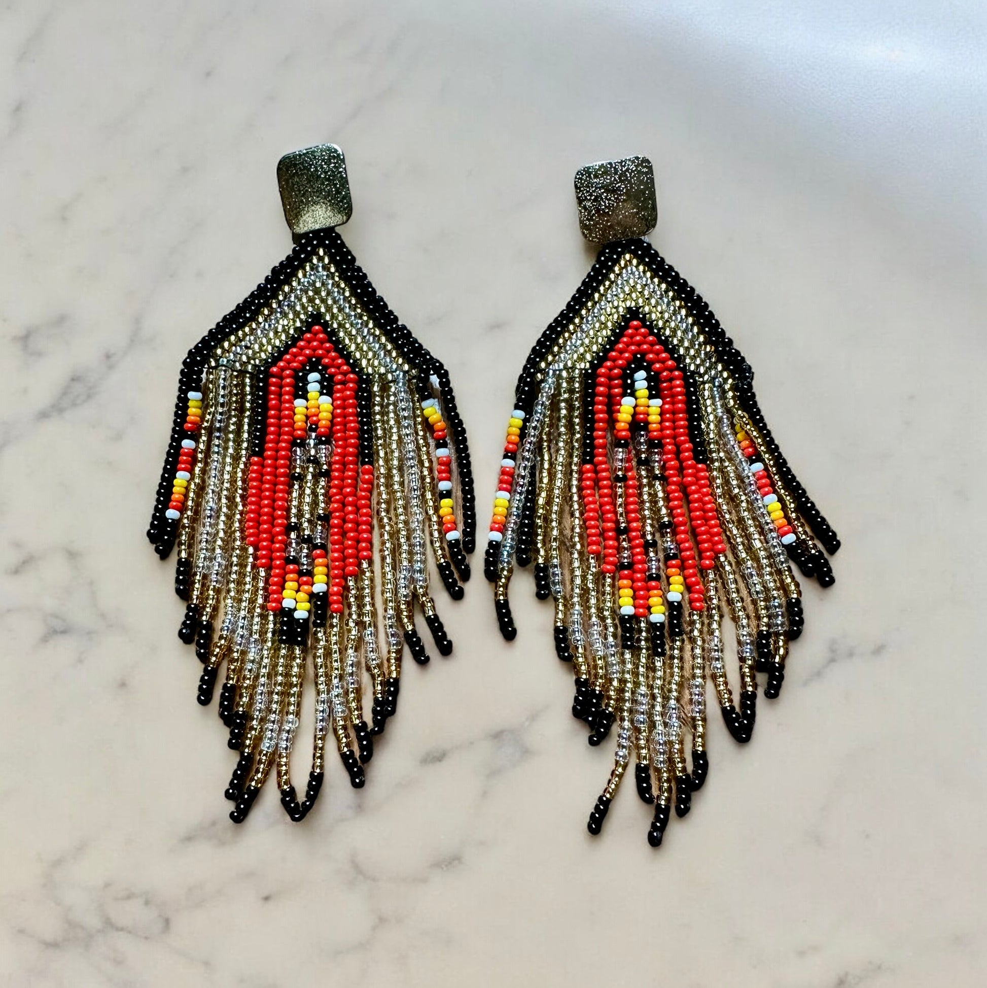 Long handmade multi color statement earrings that are ready to party!