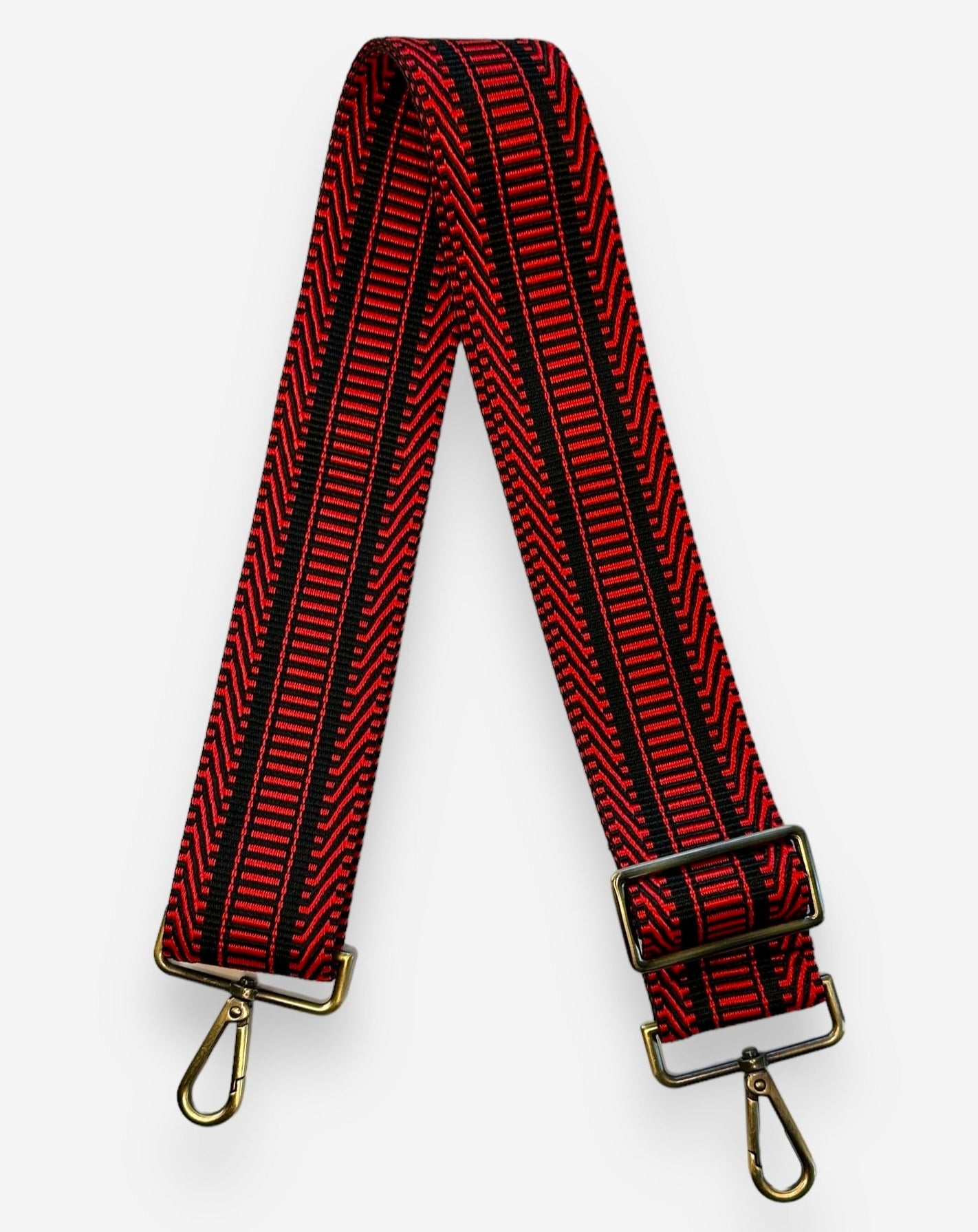 Red and black guitar webbing crossbody strap. 