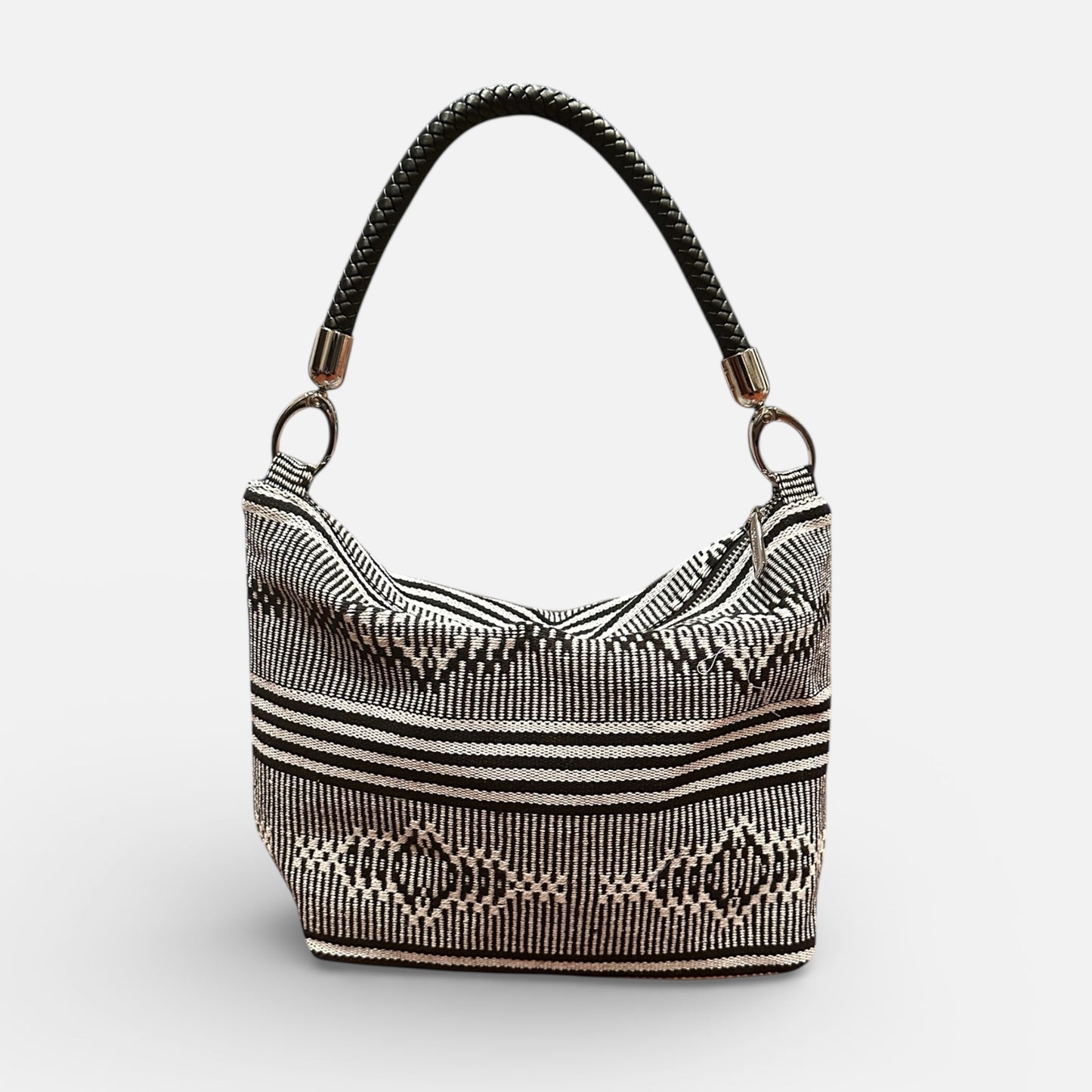 Handbag with a geometric pattern on a white background