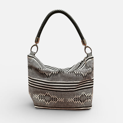 Handbag with a geometric pattern on a white background