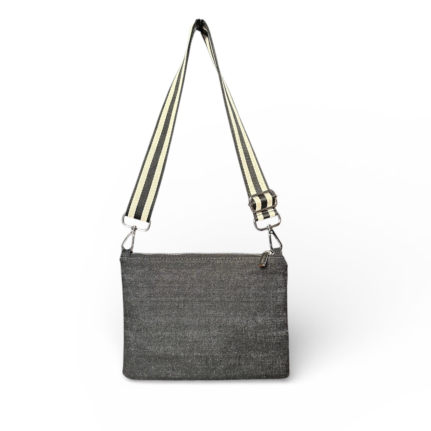 Gray crossbody bag with striped strap on a white background