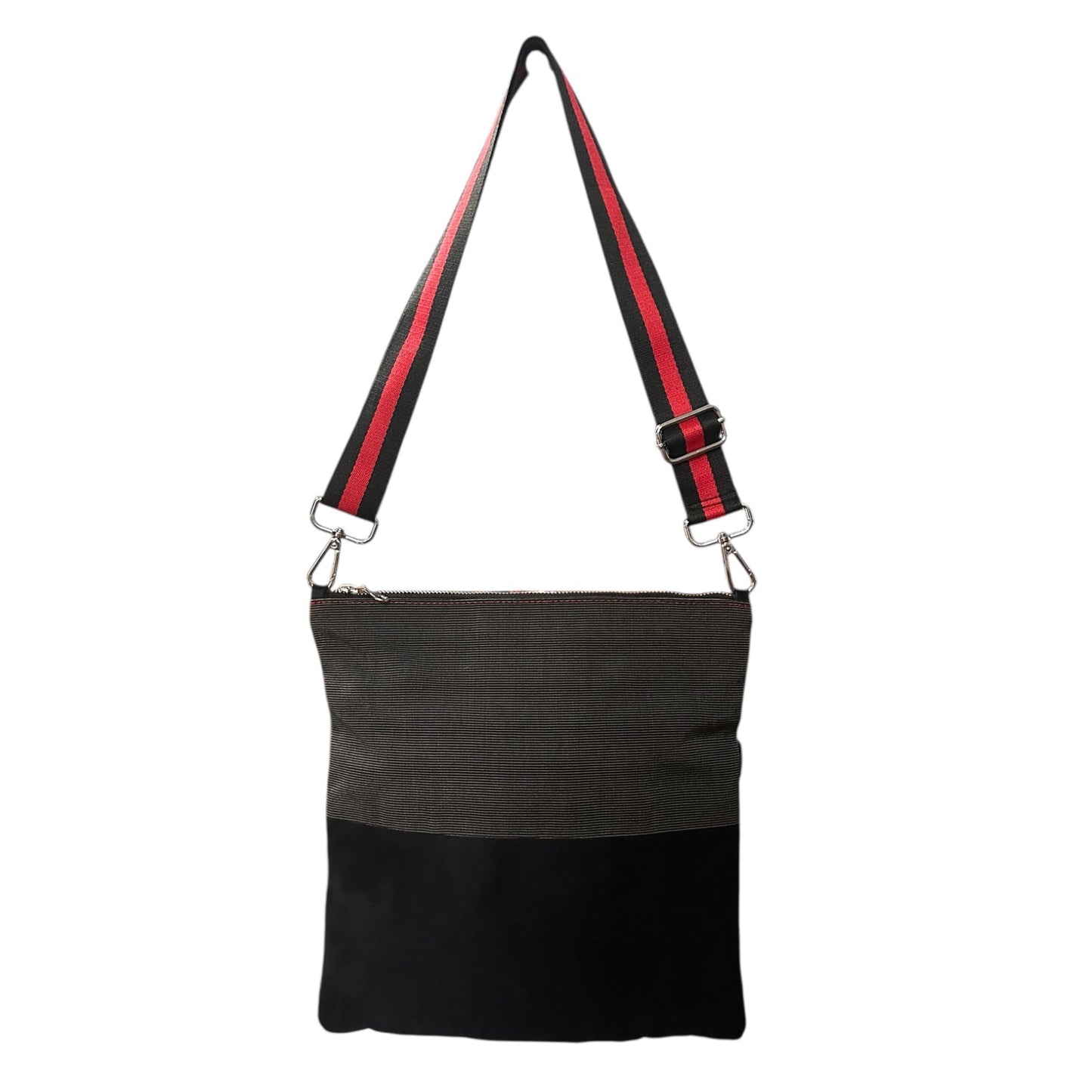 Black faux suede crossbody bag with adjustable strap and pinstripe pattern