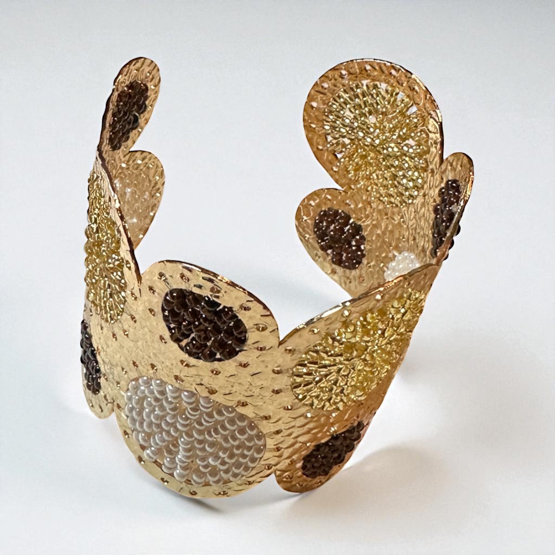 Gold wash cuff bracelet with neutral beads 