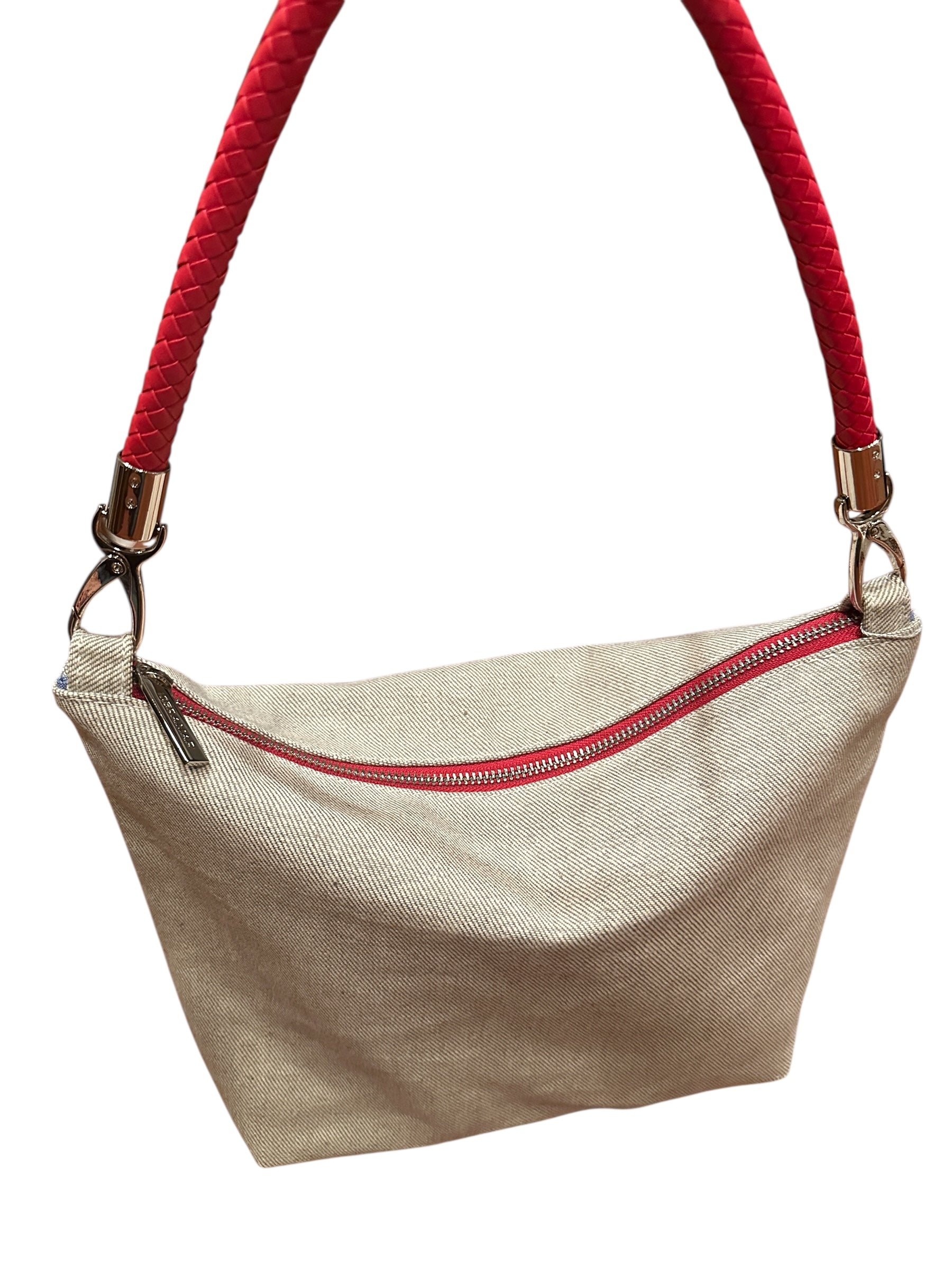 Gray handbag with red strap on a white background