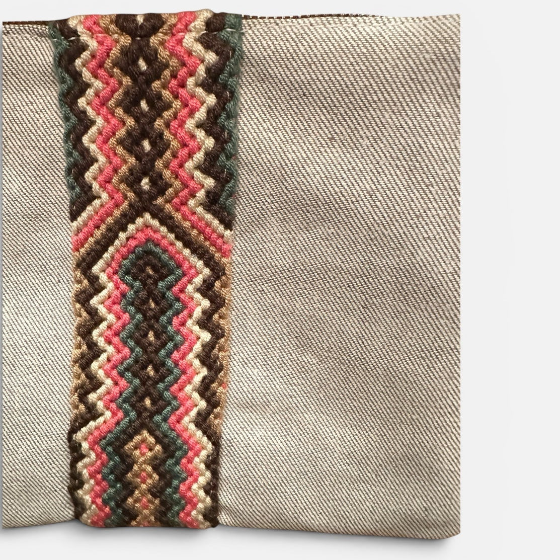 Textile with a colorful zigzag pattern on a plain background
