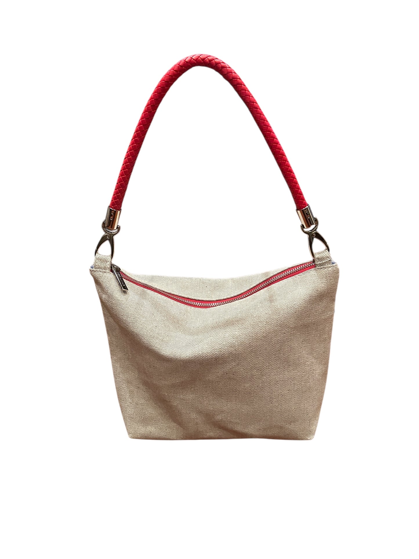 Beige handbag with a red handle on a white background