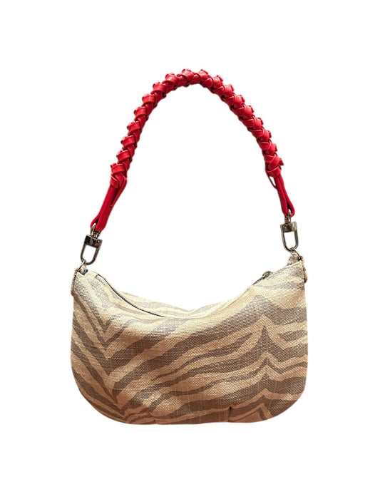 Handbag with a red handle on a white background
