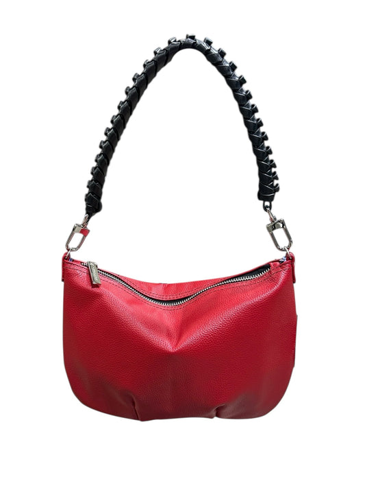 Red handbag with a black braided handle on a white background