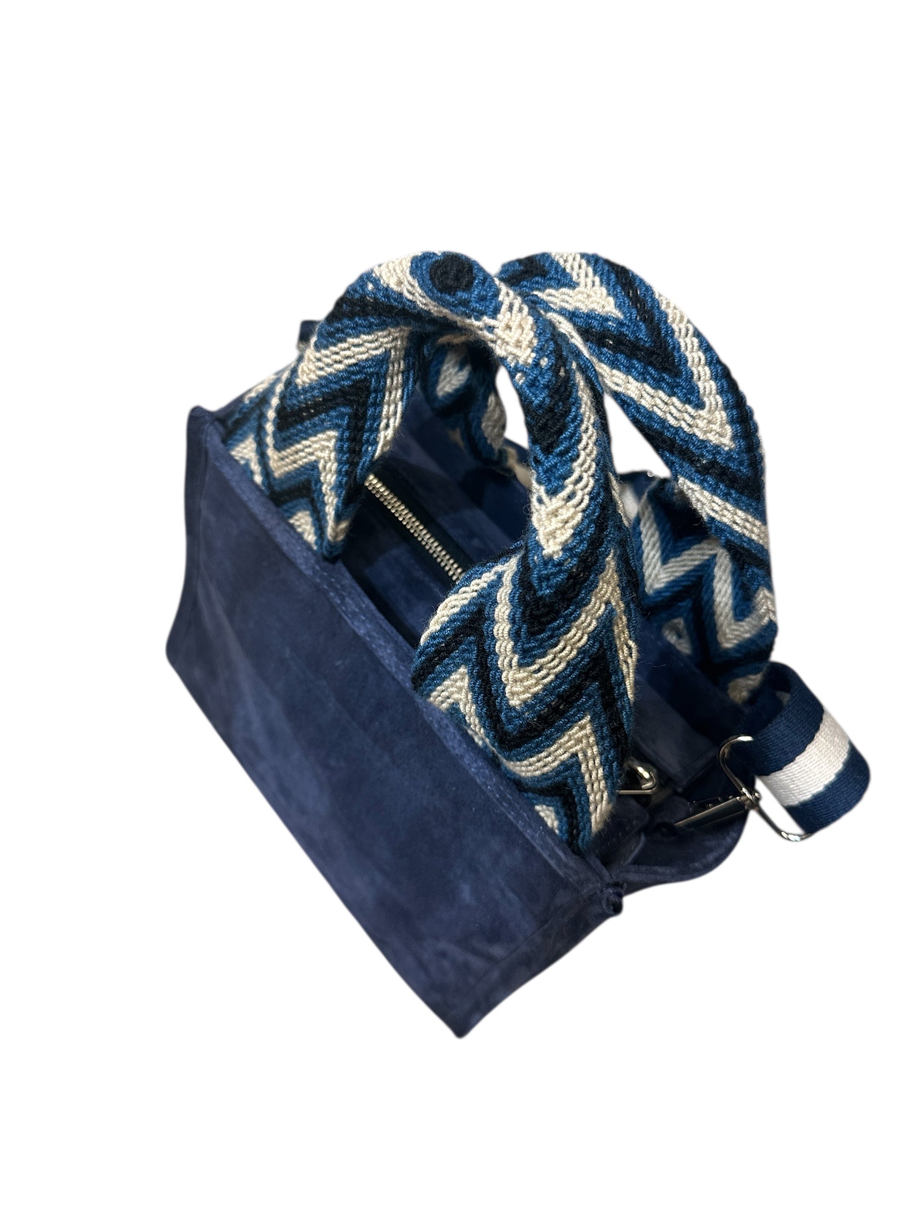 Navy blue bag with a patterned strap on a white background