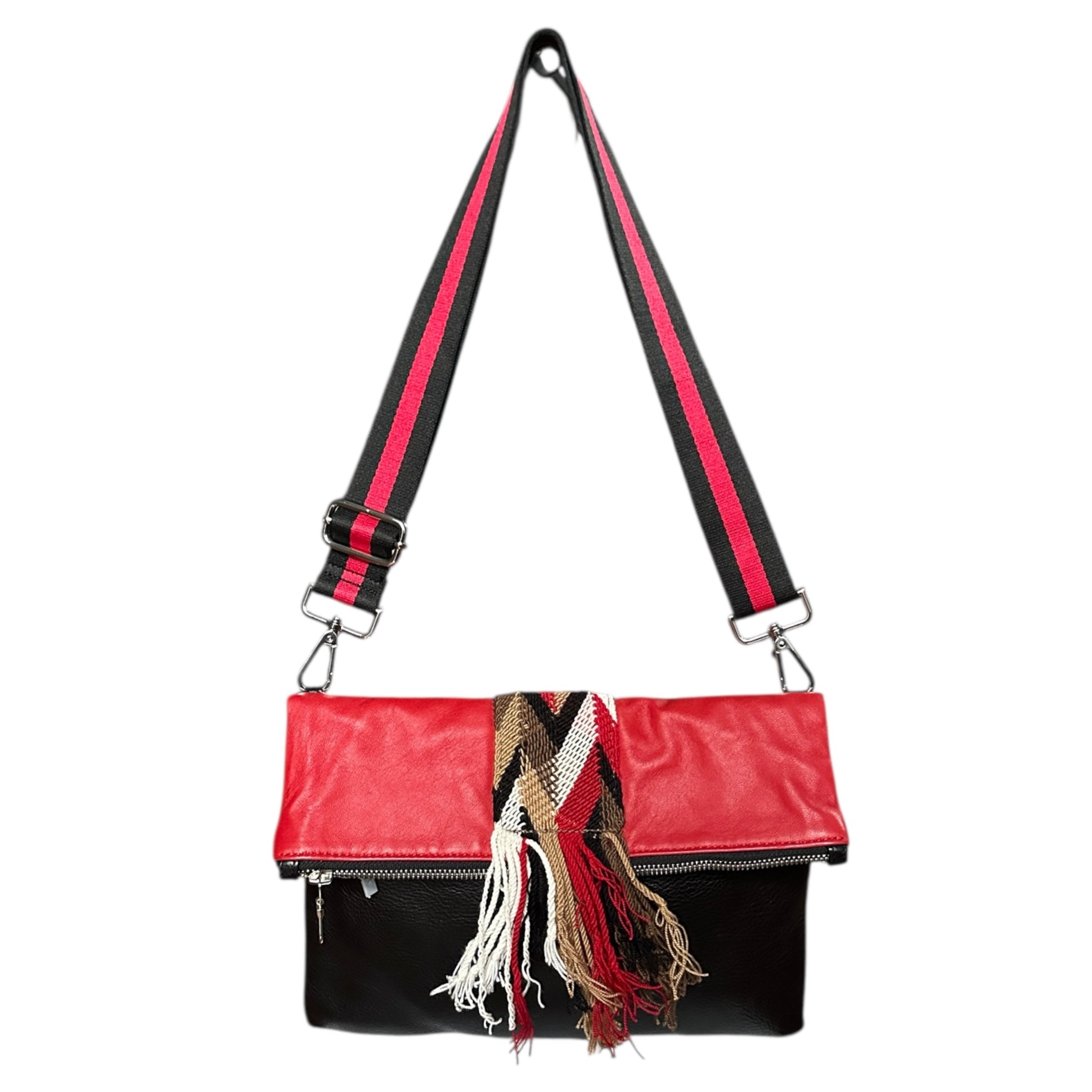 Compact red and black leather crossbody bag worn crossbody