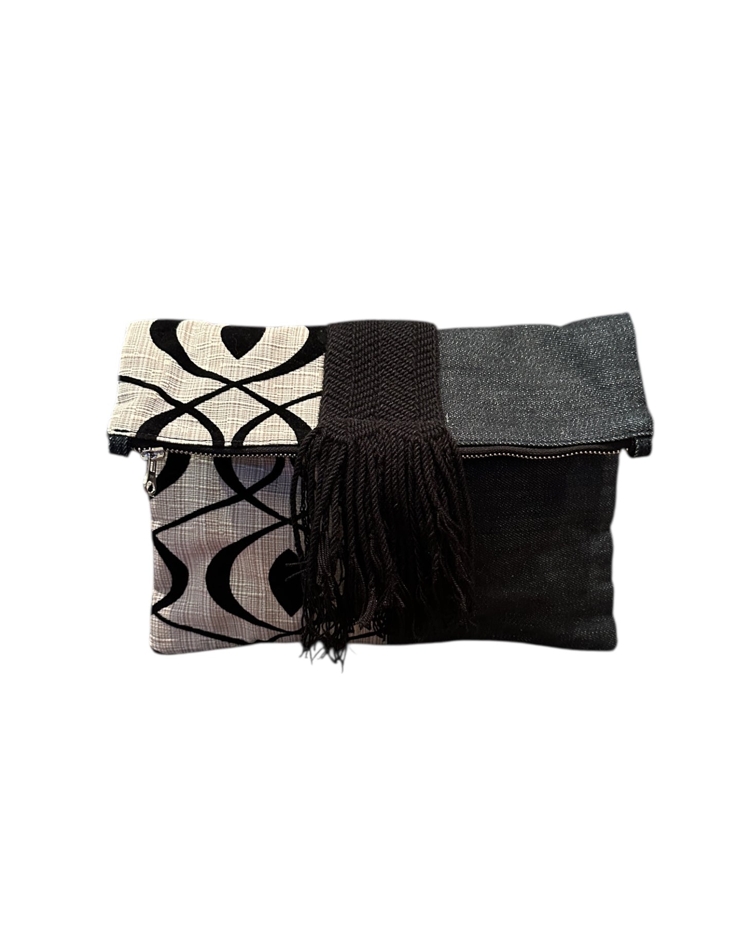 Cream and black clutch bag with modern silhouette