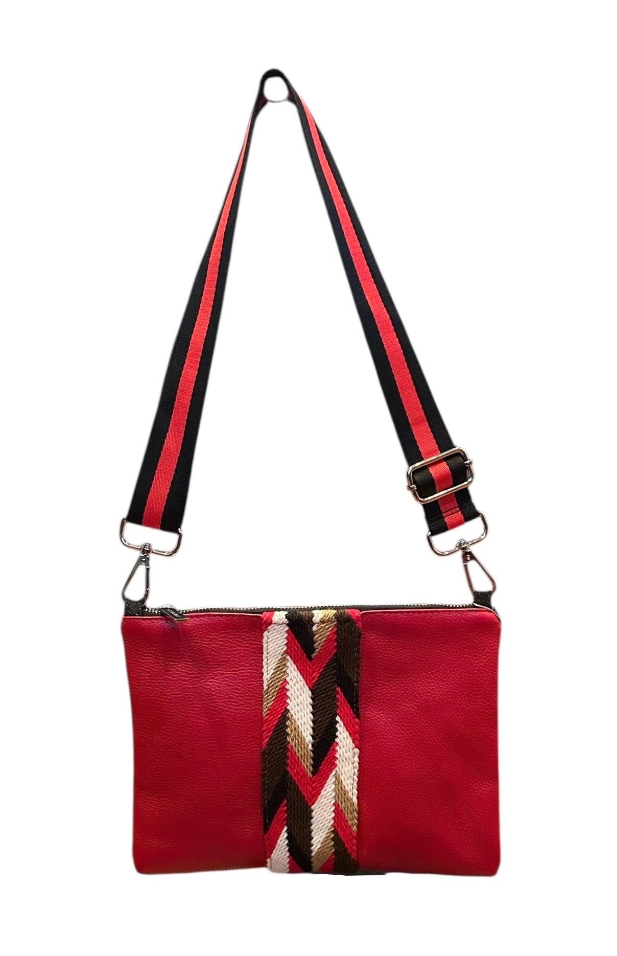 Red handbag with a black and white patterned strap on a white background