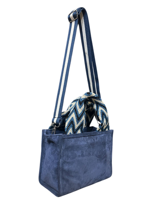 Blue tote bag with a striped scarf on a white background