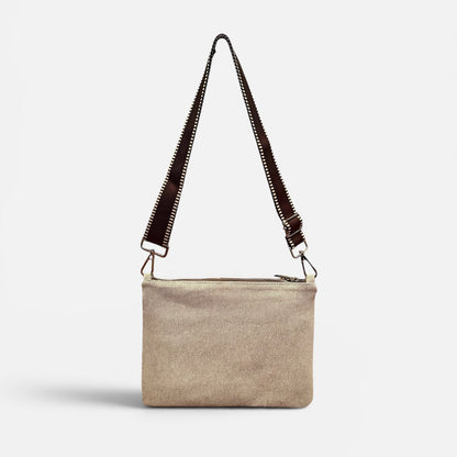 Beige crossbody bag with a strap on a white background